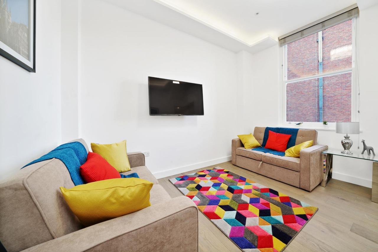 City Prime Apartments London Ngoại thất bức ảnh A living room in a serviced apartment in London