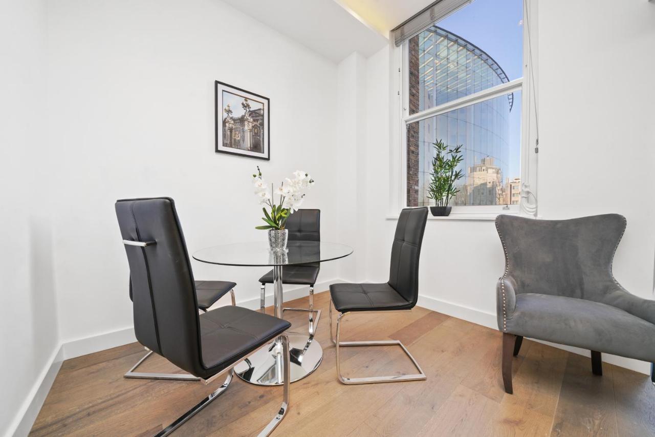 City Prime Apartments London Ngoại thất bức ảnh A staged photo of a dining room